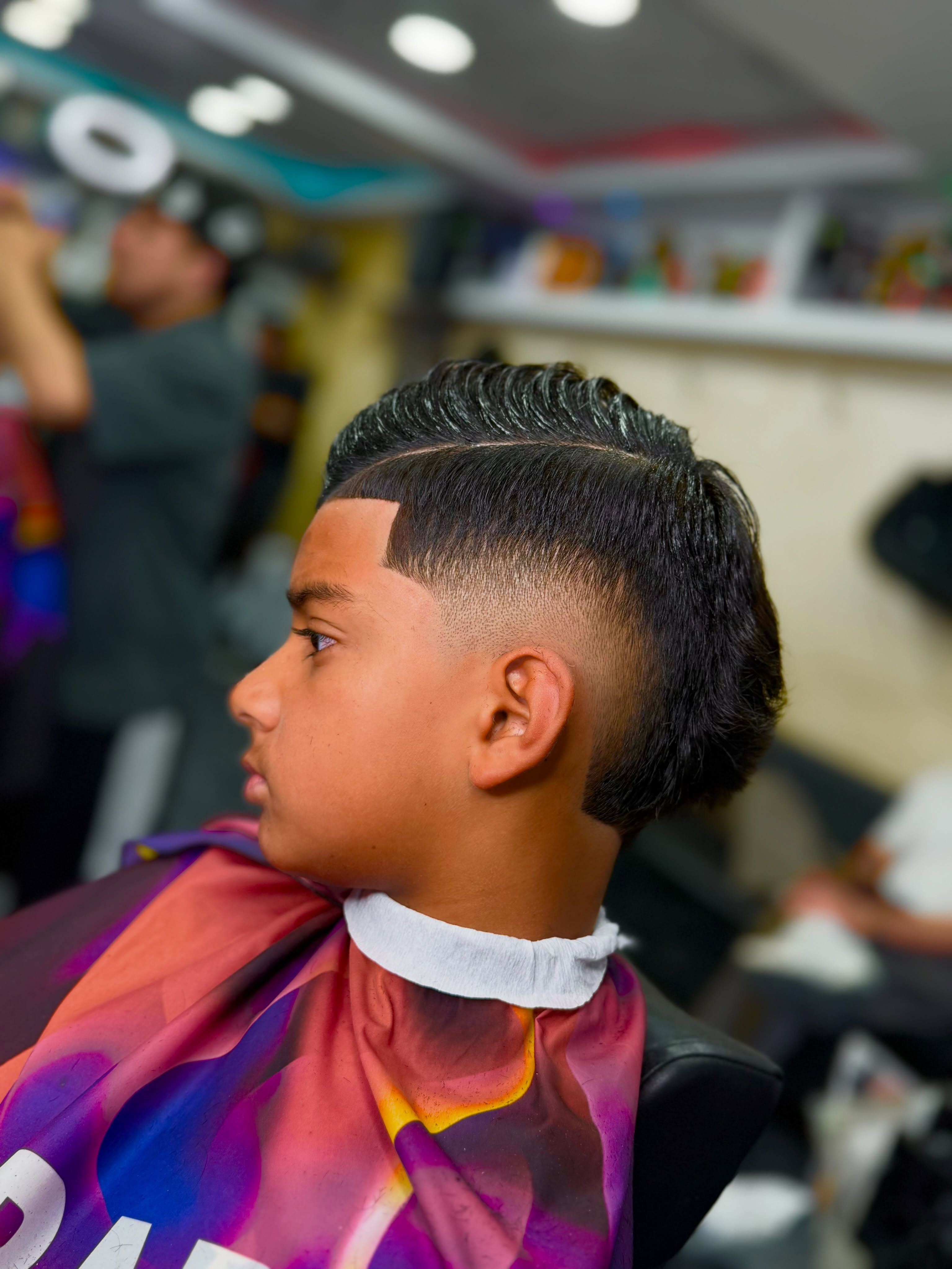 Coupe de cheveux chez Barber Tsitsi